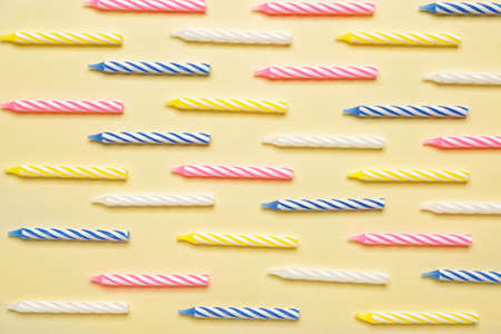 Birthday candles on color backgroundの写真素材
