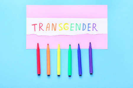 Paper with word TRANSGENDER and markers on color backgroundの写真素材