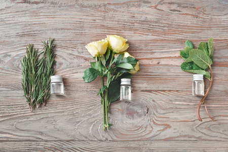 Bottles of different essential oils on tableの写真素材