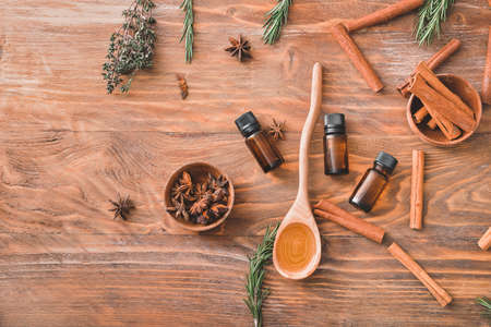 Bottles of different essential oils on tableの写真素材