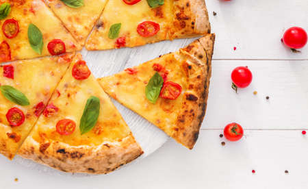 Delicious pizza Margherita on tableの写真素材