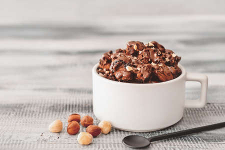Chocolate mug cake on tableの写真素材