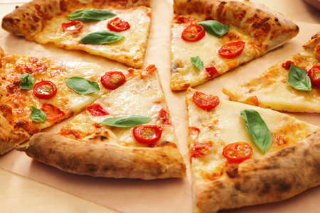 Delicious pizza Margherita on tableの写真素材