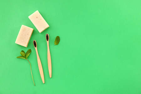 Tooth brushes and soap on color backgroundの写真素材