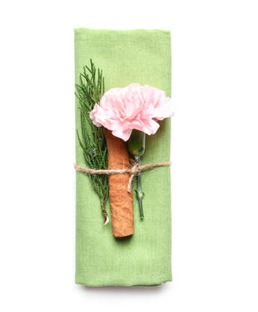 Beautiful napkin with floral decor on white backgroundの写真素材