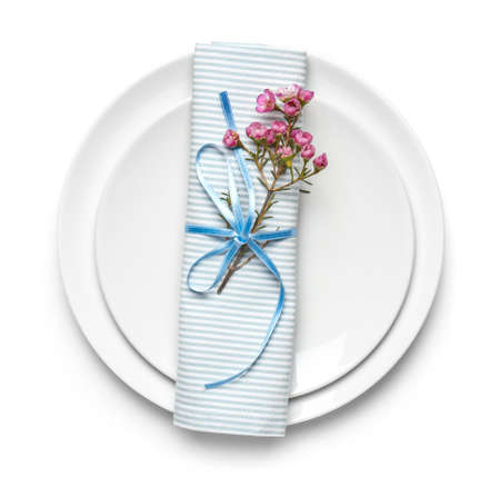 Beautiful table setting on white backgroundの写真素材