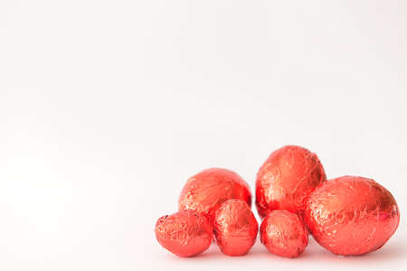 Sweet chocolate eggs on white backgroundの写真素材