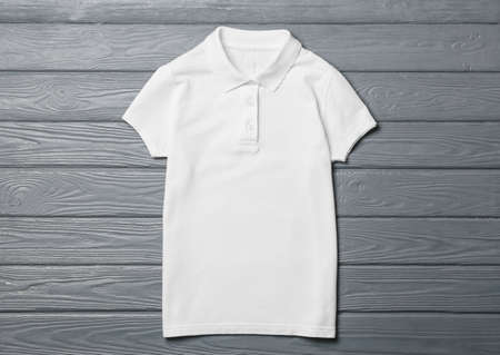 Stylish school uniform on wooden backgroundの写真素材