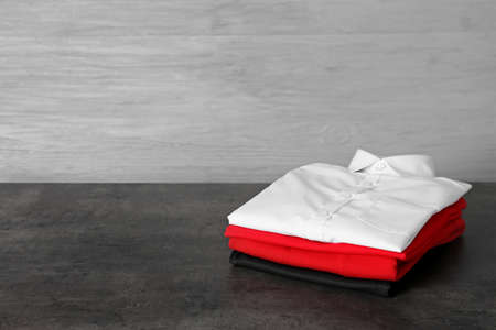 Stylish school uniform on dark tableの写真素材