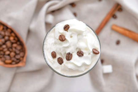 Glass of tasty iced coffee on tableの写真素材