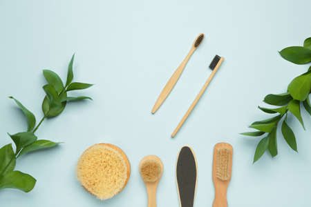 Tooth brushes with bath supplies on color backgroundの写真素材