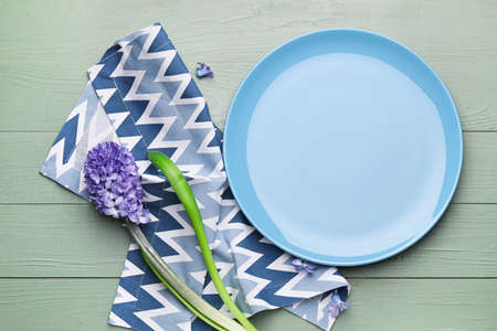 Clean napkin with plate on wooden backgroundの写真素材