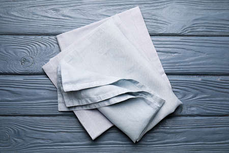 Clean napkins on wooden backgroundの写真素材
