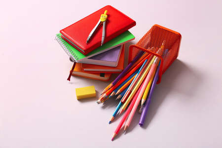 Holder with stationery on light backgroundの写真素材