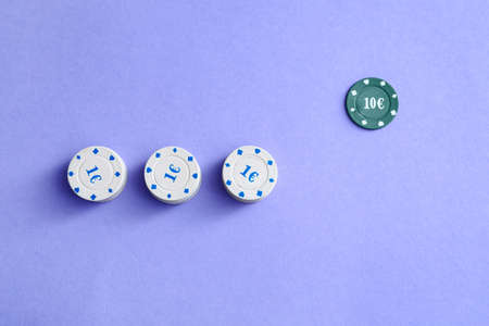 Poker chips on color background. Concept of dismissalの写真素材