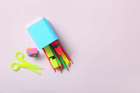 Holder with stationery on light backgroundの写真素材