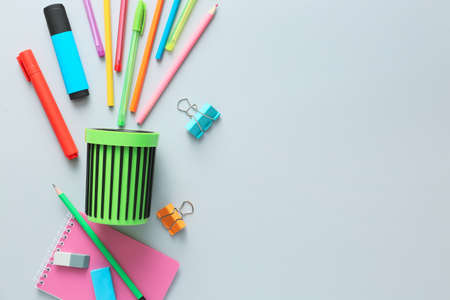 Holder with stationery on light backgroundの写真素材