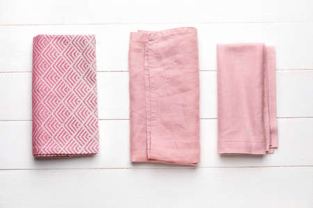 Clean napkins on wooden backgroundの写真素材