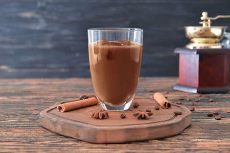 Glass of tasty iced coffee on tableの写真素材