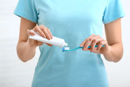 Woman with tooth brush and paste, closeupの写真素材