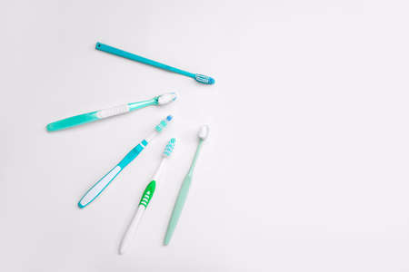 Tooth brushes with paste on white backgroundの写真素材