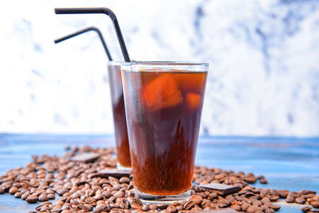 Glasses of tasty iced coffee on tableの写真素材