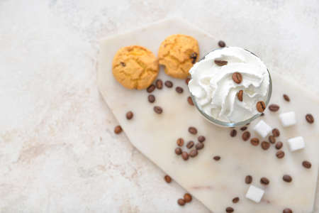 Glass of tasty iced coffee on tableの写真素材