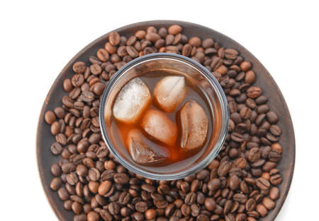 Glass of tasty iced coffee on white backgroundの写真素材