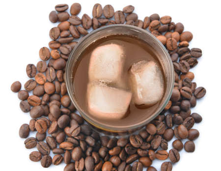 Glass of tasty iced coffee on white background
