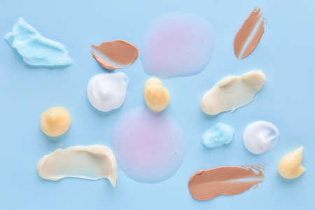 Samples of cream on color backgroundの写真素材