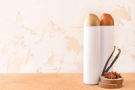 Bottles of air fresheners on tableの写真素材