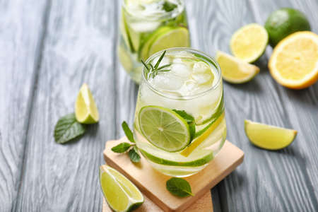 Glass of fresh lime lemonade on tableの写真素材