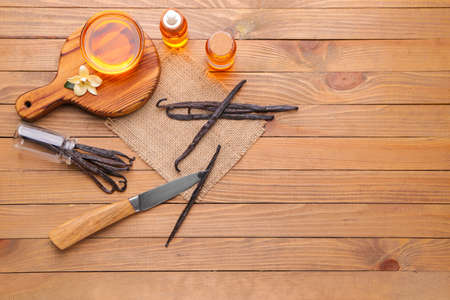 Composition with vanilla extract on tableの写真素材