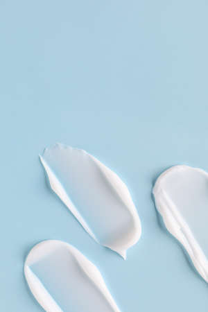 Samples of cream on color backgroundの写真素材
