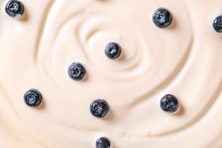 Tasty yogurt with blueberry as background, closeupの写真素材