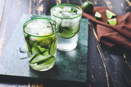 Glasses of fresh lime lemonade on tableの写真素材