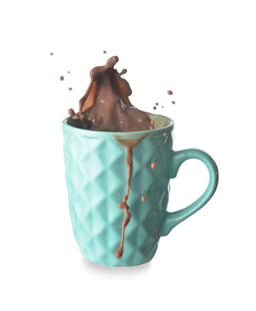 Cup with splashing cocoa drink isolated on whiteの写真素材