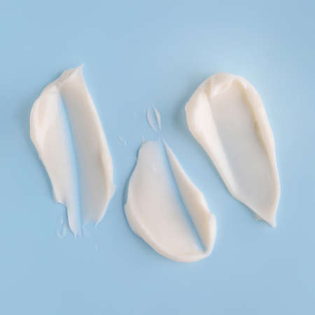 Samples of cream on color backgroundの写真素材