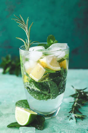 Glass of fresh lime lemonade on tableの写真素材