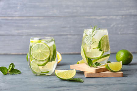 Glasses of fresh lime lemonade on tableの写真素材