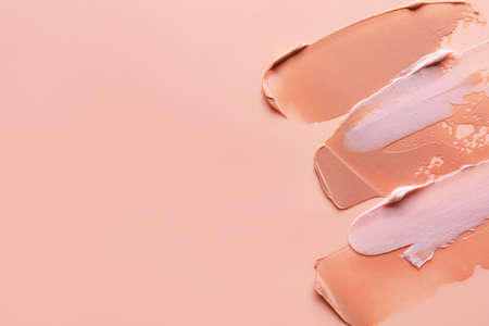 Samples of cream on color backgroundの写真素材