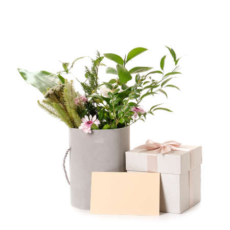 Gifts for Mother's Day and blank card on white backgroundの写真素材