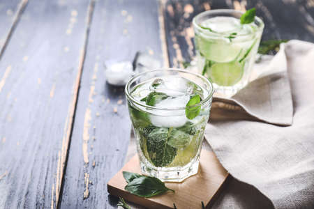 Glasses of fresh lime lemonade on tableの写真素材