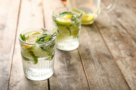 Glasses of fresh lime lemonade on tableの写真素材