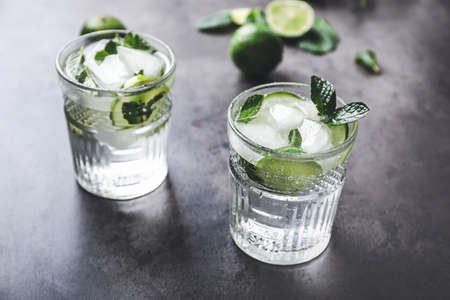 Glasses of fresh lime lemonade on tableの写真素材