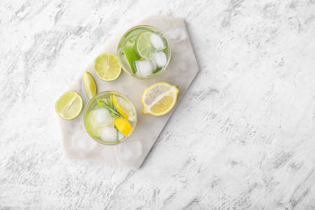 Glasses of fresh lime lemonade on tableの写真素材