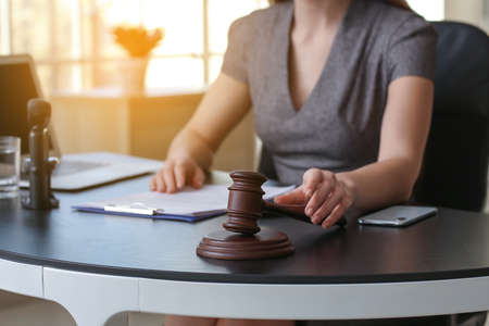 Female lawyer working with document in officeの写真素材