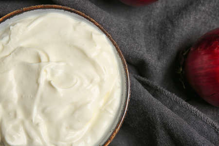 Bowl of tasty sour cream on table, closeupの写真素材