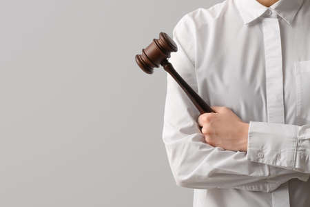 Female judge on light background, closeupの写真素材