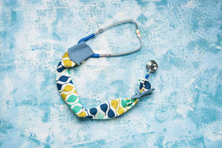 Stethoscope with cover on color backgroundの写真素材